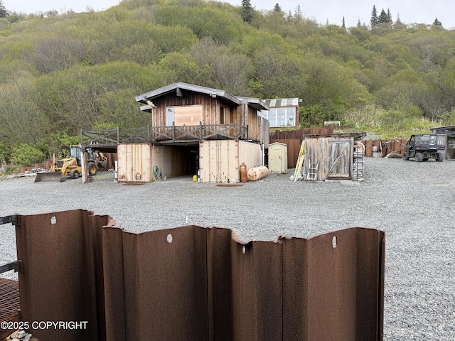 25646 Hawks Beach Rem SW, Anchor Point, AK 99556 - rear view of property featuring a forest view