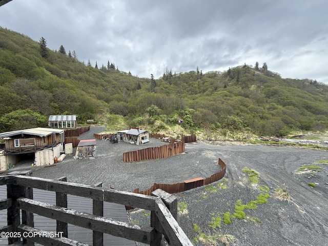 25646 Hawks Beach Rem SW, Anchor Point, AK 99556 - view of mountain background with a heavily wooded area