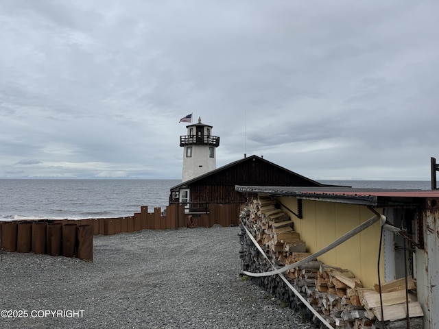 25646 Hawks Beach Rem SW, Anchor Point, AK 99556 - rear view of property with a chimney and a water view