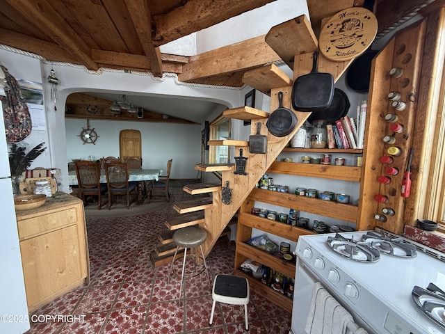 25646 Hawks Beach Rem SW, Anchor Point, AK 99556 - wine cellar featuring beam ceiling and arched walkways