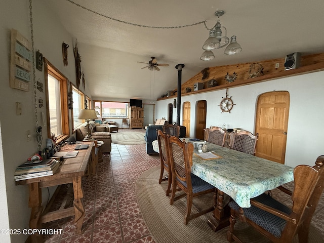 25646 Hawks Beach Rem SW, Anchor Point, AK 99556 - dining area with vaulted ceiling and a ceiling fan