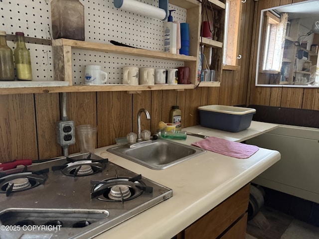 25646 Hawks Beach Rem SW, Anchor Point, AK 99556 - kitchen featuring stovetop, wood walls, and open shelves