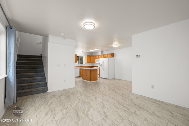 5622 E 4th Ave Unit 12, Anchorage, AK 99504 - unfurnished living room with stairway