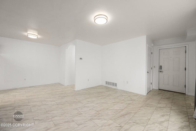 5622 E 4th Ave Unit 12, Anchorage, AK 99504 - empty room with light marble finish floors