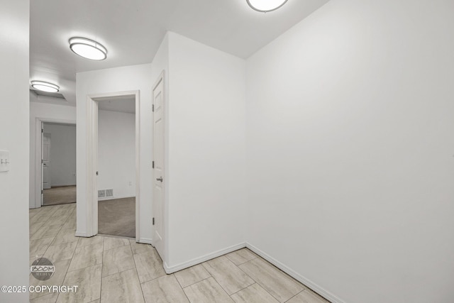 5622 E 4th Ave Unit 12, Anchorage, AK 99504 - spare room featuring baseboards
