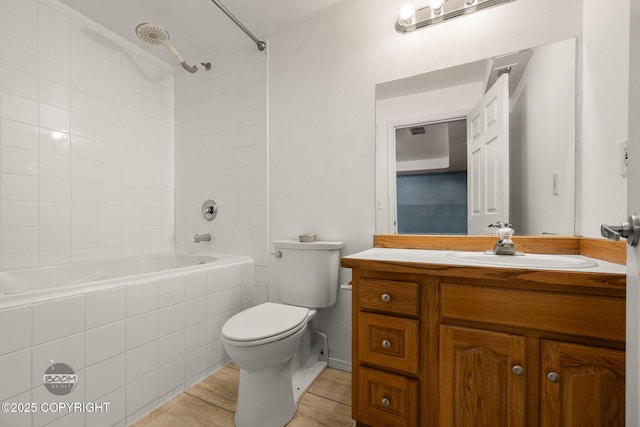 5622 E 4th Ave Unit 12, Anchorage, AK 99504 - bathroom featuring tiled shower / bath combo and vanity