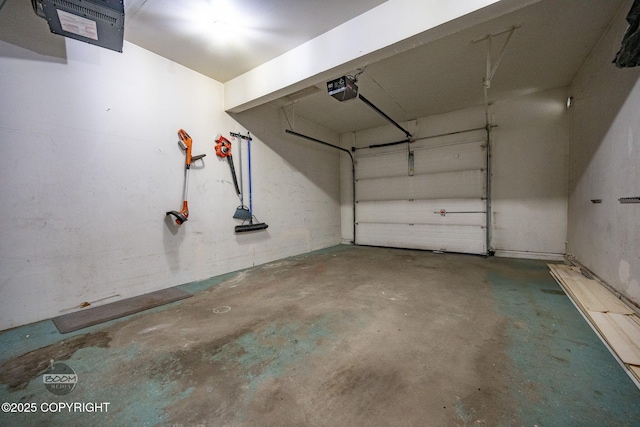 5622 E 4th Ave Unit 12, Anchorage, AK 99504 - garage featuring a garage door opener and a heating unit