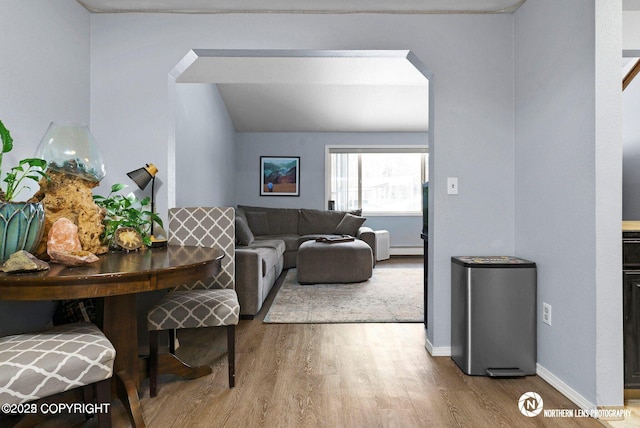 1441 E 17th Ave # 11, Anchorage, AK 99501 - living area with wood finished floors and arched walkways