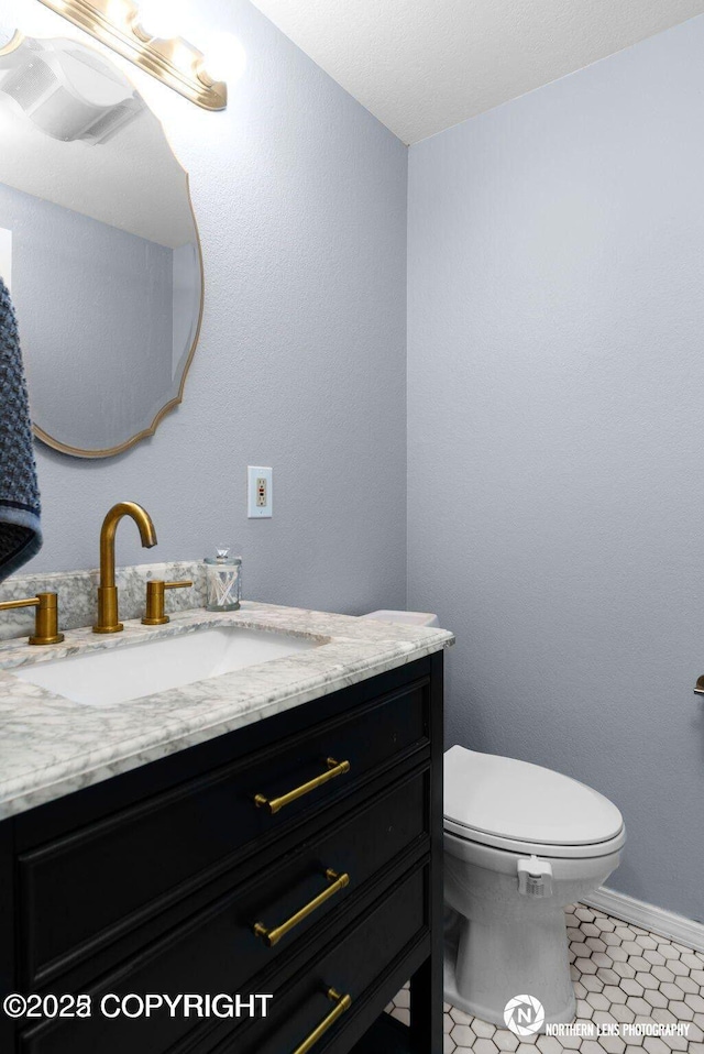 1441 E 17th Ave # 11, Anchorage, AK 99501 - bathroom featuring vanity and tile patterned floors