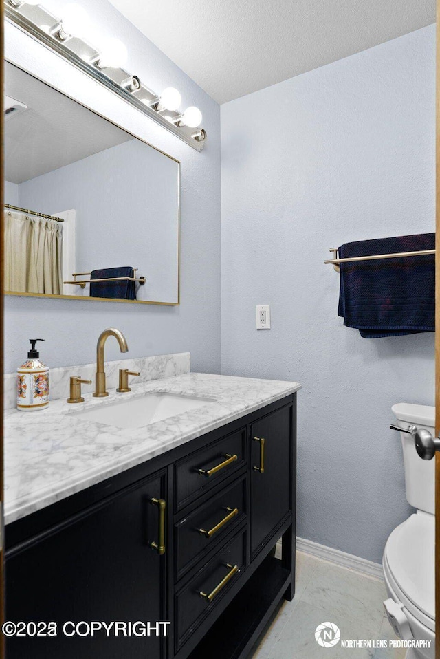 1441 E 17th Ave # 11, Anchorage, AK 99501 - full bathroom featuring vanity and toilet