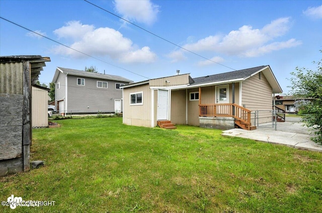 4335 E 6th Ave, Anchorage, AK 99508 - back of property featuring entry steps