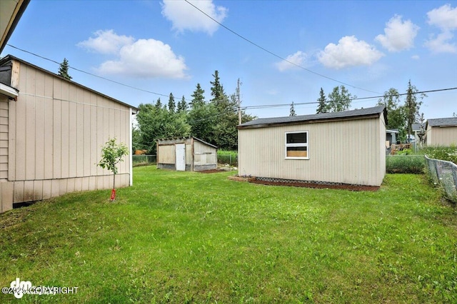 4335 E 6th Ave, Anchorage, AK 99508 - view of yard with a shed