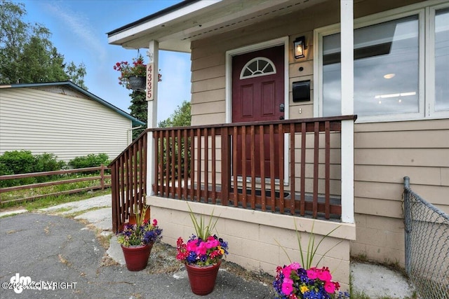 4335 E 6th Ave, Anchorage, AK 99508 - view of exterior entry featuring covered porch