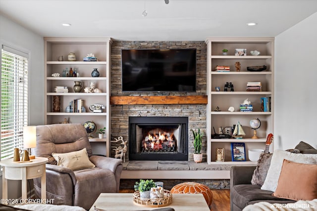 15250 Evergreen Ridge St, Anchorage, AK 99516 - living area with wood finished floors and a stone fireplace