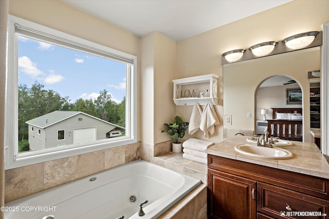 15250 Evergreen Ridge St, Anchorage, AK 99516 - bathroom featuring a jetted tub and vanity
