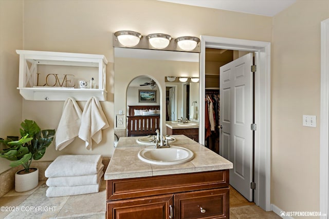 15250 Evergreen Ridge St, Anchorage, AK 99516 - bathroom with vanity and a walk in closet