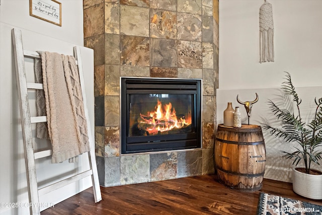 15250 Evergreen Ridge St, Anchorage, AK 99516 - detailed view of wood finished floors and a tiled fireplace
