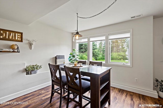 15250 Evergreen Ridge St, Anchorage, AK 99516 - dining space featuring dark wood-type flooring