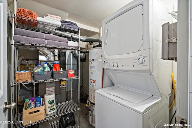 15250 Evergreen Ridge St, Anchorage, AK 99516 - laundry area featuring stacked washer and clothes dryer and strapped water heater