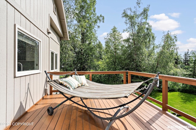 15250 Evergreen Ridge St, Anchorage, AK 99516 - deck with a yard and view of wooded area