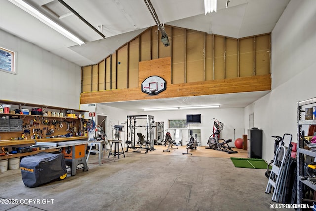 15250 Evergreen Ridge St, Anchorage, AK 99516 - garage with a workshop area