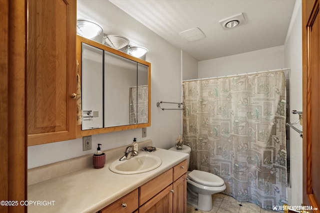 3217 Purdue St, Anchorage, AK 99508 - full bath with vanity, tile patterned floors, and a shower with shower curtain