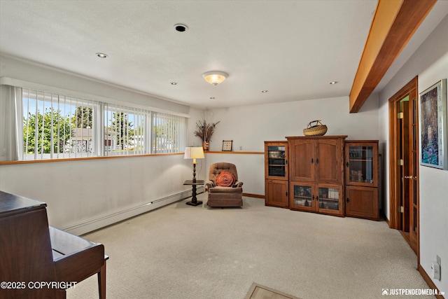 3217 Purdue St, Anchorage, AK 99508 - sitting room featuring baseboard heating, carpet flooring, and recessed lighting