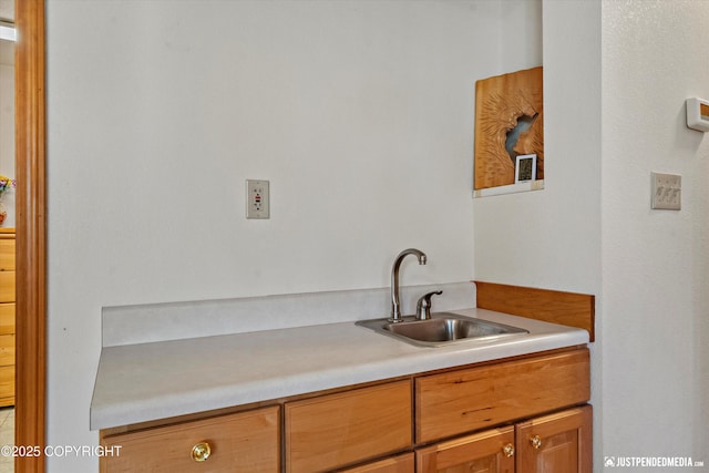 3217 Purdue St, Anchorage, AK 99508 - kitchen featuring a sink and light countertops
