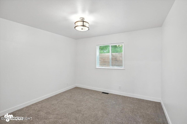 1928 Commodore Dr, Anchorage, AK 99507 - spare room featuring carpet floors