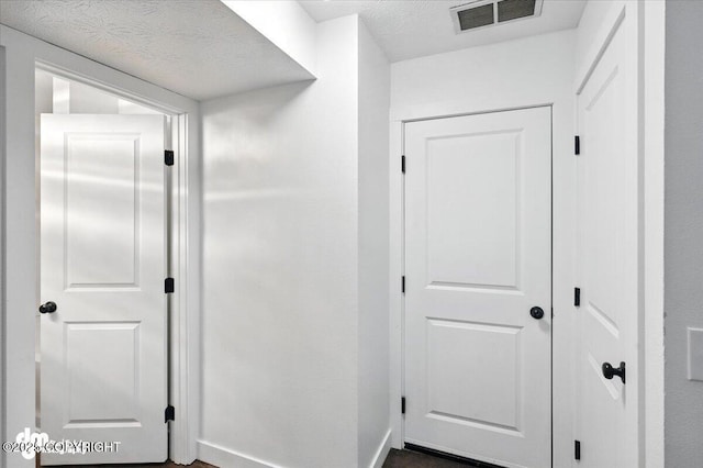 1928 Commodore Dr, Anchorage, AK 99507 - hallway featuring baseboards