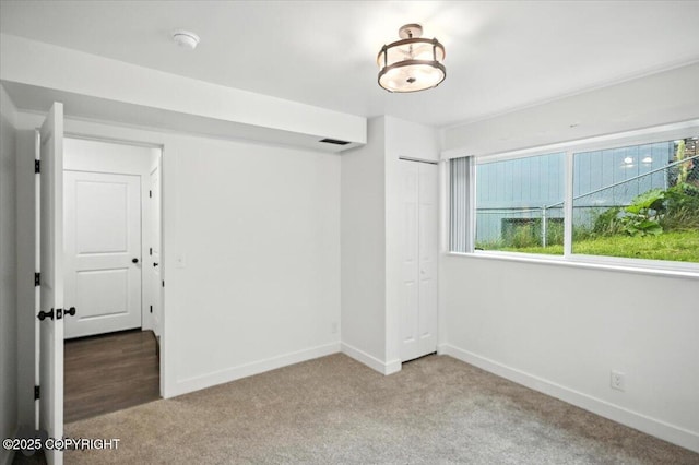 1928 Commodore Dr, Anchorage, AK 99507 - carpeted empty room featuring baseboards and a smoke detector