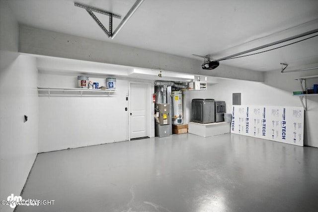 1928 Commodore Dr, Anchorage, AK 99507 - garage featuring water heater, a garage door opener, and electric panel