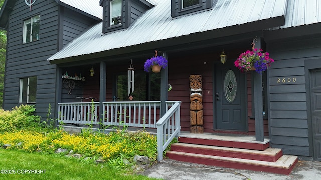 2600 Birch St, Seward, AK 99664 - doorway to property with a porch and a metal roof