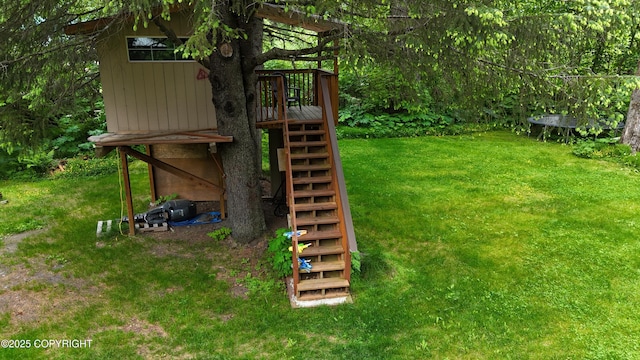 2600 Birch St, Seward, AK 99664 - view of grassy yard with stairs and a wooden deck