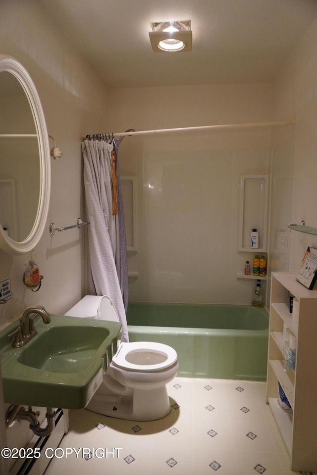 2600 Birch St, Seward, AK 99664 - bathroom with shower / bath combo with shower curtain and toilet
