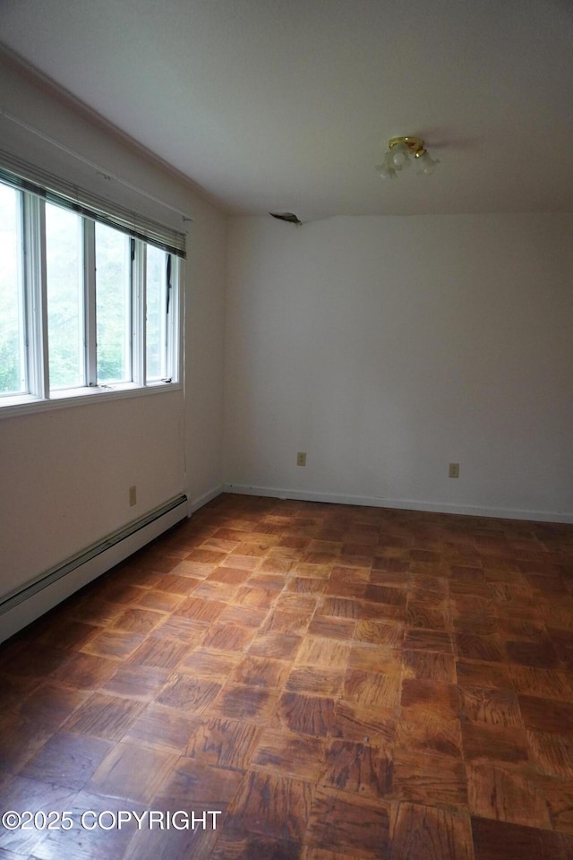 2600 Birch St, Seward, AK 99664 - empty room featuring baseboard heating and baseboards