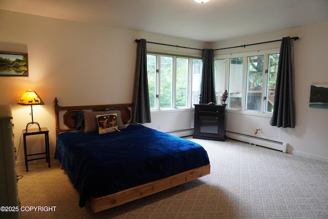 2600 Birch St, Seward, AK 99664 - carpeted bedroom with a baseboard radiator
