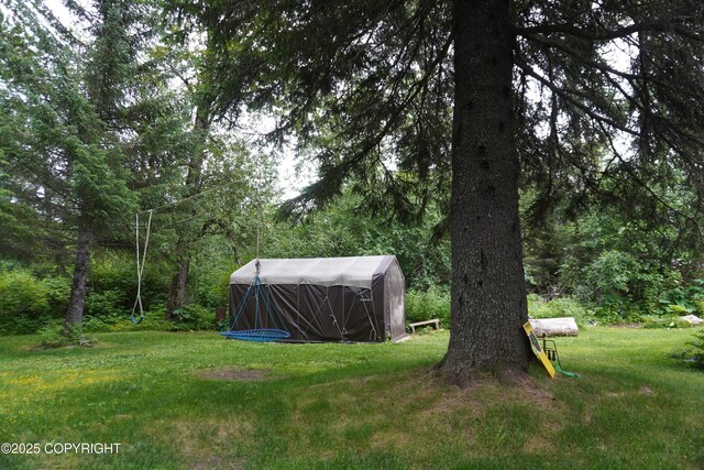2600 Birch St, Seward, AK 99664 - view of grassy yard with a forest view