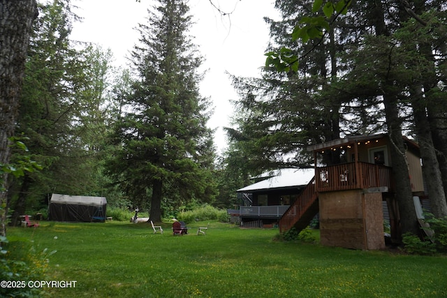 2600 Birch St, Seward, AK 99664 - view of green lawn featuring stairway and a wooden deck