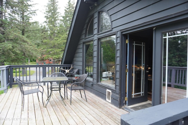 2600 Birch St, Seward, AK 99664 - wooden deck featuring outdoor dining space
