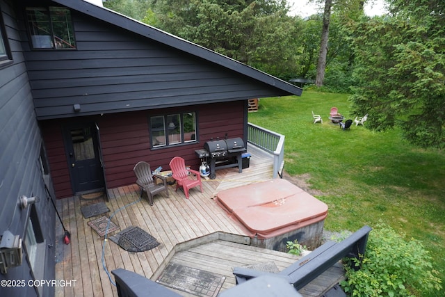 2600 Birch St, Seward, AK 99664 - wooden terrace featuring a lawn and a covered hot tub