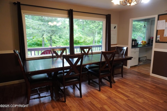 2600 Birch St, Seward, AK 99664 - dining space with a chandelier and wood finished floors