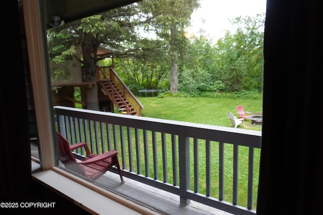 2600 Birch St, Seward, AK 99664 - deck with stairway, a lawn, and an outdoor fire pit