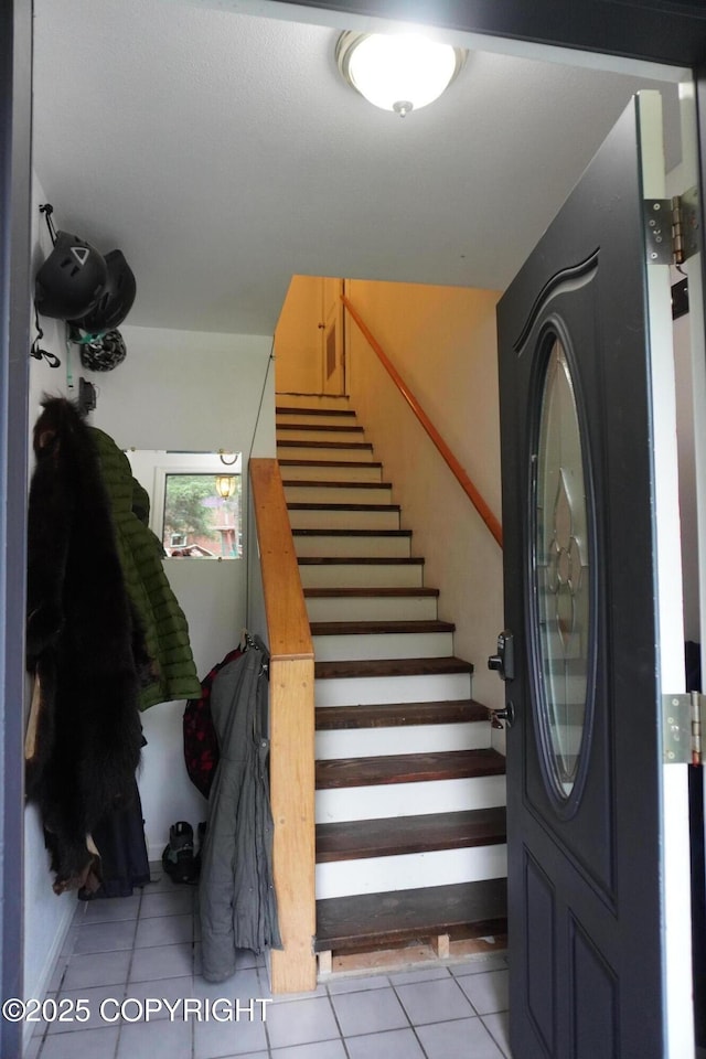 2600 Birch St, Seward, AK 99664 - entrance foyer featuring tile patterned floors and stairs