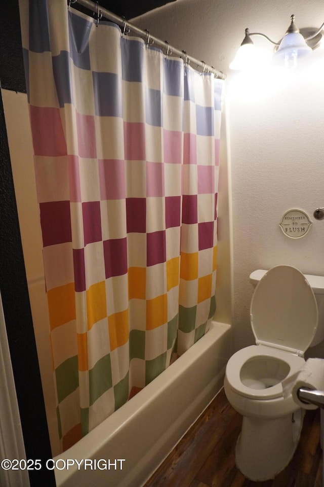 2600 Birch St, Seward, AK 99664 - full bath featuring wood finished floors and shower / bath combo with shower curtain