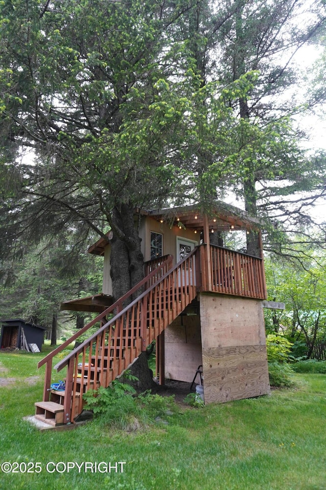 2600 Birch St, Seward, AK 99664 - back of property with stairs and a lawn