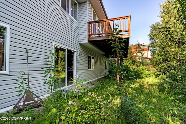 9700 E Strand Dr, Palmer, AK 99645 - view of side of home featuring a wooden deck