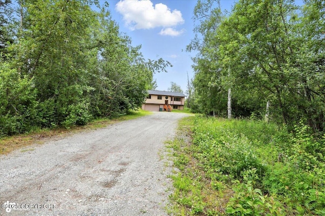 840 N Voss Cir, Wasilla, AK 99623 - raised ranch with driveway and a garage