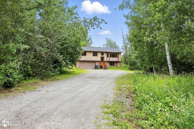 840 N Voss Cir, Wasilla, AK 99623 - raised ranch with driveway and stairway