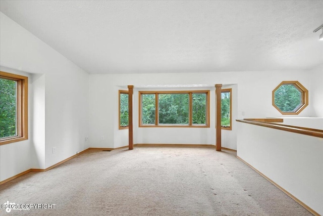840 N Voss Cir, Wasilla, AK 99623 - empty room with carpet floors and a textured ceiling